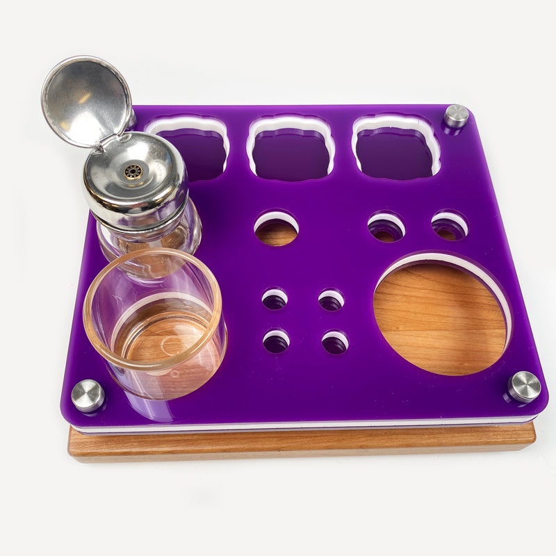 This is what you will receive when you purchase a Focus V Carta rig station from us. The tray is 8X7 with cut outs for your vaporizer, a Saber electronic dab tool, extra buckets and carb caps. Holders for 4 dab jars, the ISO pump and swab holder.